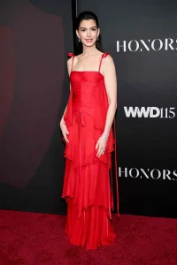 Anne Hathaway Stuns in Red Dress Tied with Tiny Bows