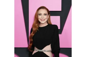 Lindsay Lohan Stuns With Curve Cut Debut and Y2K Flip-Flops