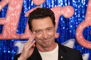 Hugh Jackman Raises Eyebrows Singing at Murdoch’s Party