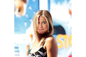 Jennifer Aniston’s Sweet On-Set PDA with Jim Curtis Sparks Buzz